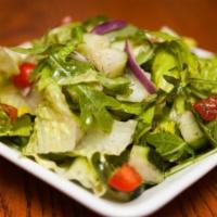 L1. Dinner Salad · Lettuce, Tomato, Cucumber, Mozzarella Cheese and croutons with your choice of dressing.