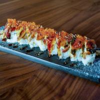 Brentwood PD Roll · Shrimp tempura, spicy tuna, crab, avocado, topped with unagi and tobiko.