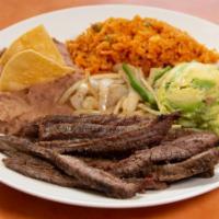 Beef Fajitas Plate · Our award-winning, flavorful beef fajitas are served with grilled onions, freshly cut lettuc...