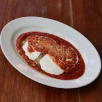 Eggplant Parm · Thick slice of eggplant, roasted and topped with tomato sauce, mozzarella and grana. Gluten ...