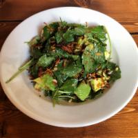 Baby Kale Salad · Baby kale tossed in tahini dressing, topped with fresh avocado, crisped sweet potato, and su...