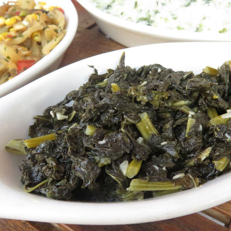 Sauteed Kale · Sauteed kale with garlic and white wine. Vegan and gluten free.`
