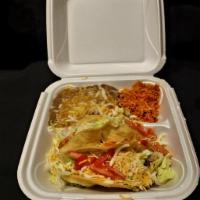 Tacos · Tacos filled with choice of ground beef or chicken with lettuce, tomato and cheese 3 hard sh...