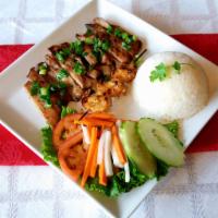 66. Grilled Pork and Shrimp Rice · Com heo tom.
