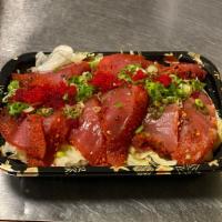 Tuna Tataki · Thin slices of tuna, served with ponzu sauce.