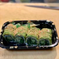 Vegetable Dragon Roll · Seaweed salad, cucumber, asparagus inside, avocado, crushed peanuts on the top.
