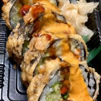 Ultimate Veggie Roll · Broccoli, carrots, asparagus, avocado inside, lightly fried with chef's special sauce on top.