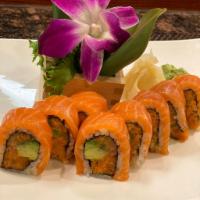 S19. Orange Roll · Spicy salmon with avocado and topped with salmon.