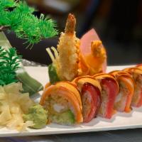 S30. Angel Roll · Inside: shrimp tempura, avocado, cucumber, soybean paper. Topped: salmon and tuna, eel sauce...