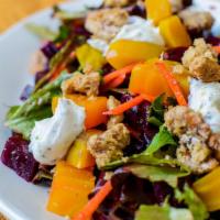 Beet Salad · greens, red & gold beets, carrots, goat cheese, candied walnuts, parsley, herb vinaigrette