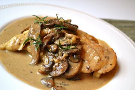 Chicken Marsala · Sauteed with mushrooms in Marsala wine sauce. Served with pasta and salad.