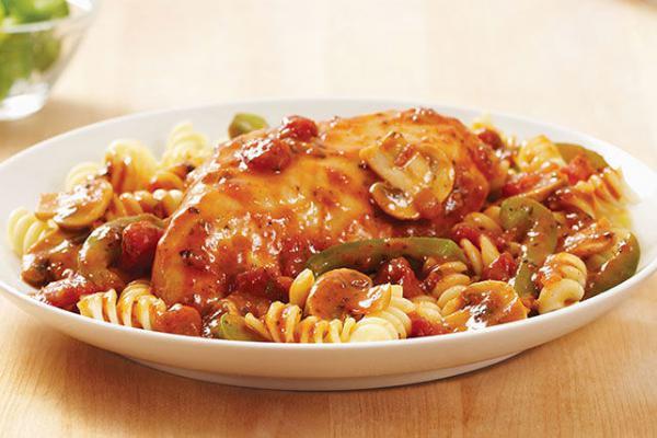 Chicken Cacciatore · Sauteed with onions, peppers and mushrooms in a light tomato sauce. Served with pasta and salad.