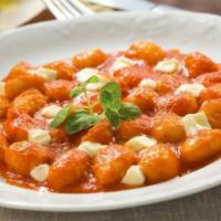 Gnocchi Sorrento · Potato pasta in tomato and basil sauce baked with fresh mozzarella. 