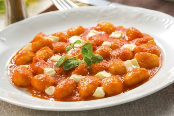Gnocchi Sorrento · Potato pasta in tomato and basil sauce baked with fresh mozzarella. 