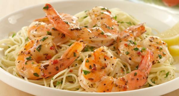 Shrimp Scampi · Shrimp sauteed in white wine, lemon and garlic sauce over pasta.