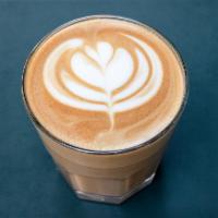Latte · A double shot of ilcaffe espresso (2 oz) usually served with 10 oz of steamed milk