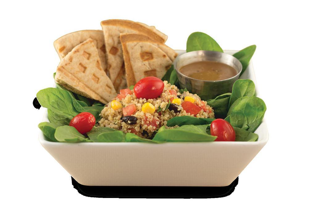 Quinoa Black Bean Salad · White grain quinoa with pico de gallo, black beans, corn and cherry tomatoes served
 on a bed of spinach with a side of balsamic vinaigrette and pita chips.