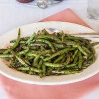 Szechuan Green Beans · Green beans sautéed in a spicy brown sauce. Hot and spicy.