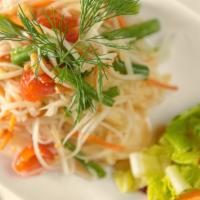 Somtum Papaya Salad · Chopped chicken, ground roasted rice, red onion, fresh mint leaves, fish sauce, scallion, ci...