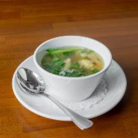 Chingri Dumpling Soup · Minced chicken and shrimp wonton in a flavorful clear chicken broth with baby bok choy, cabb...
