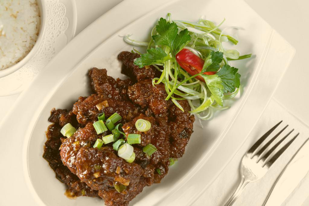 Manchurian Special · Your choice of protein seasoned with our special house seasoning blend of ginger, garlic, Thai chili and scallion, served with spicy Manchurian sauce.