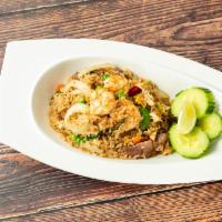 Chingri Special Fried Rice · Thai-style fried jasmine rice with beef, chicken, shrimp, egg, fresh garlic, basil, green pe...