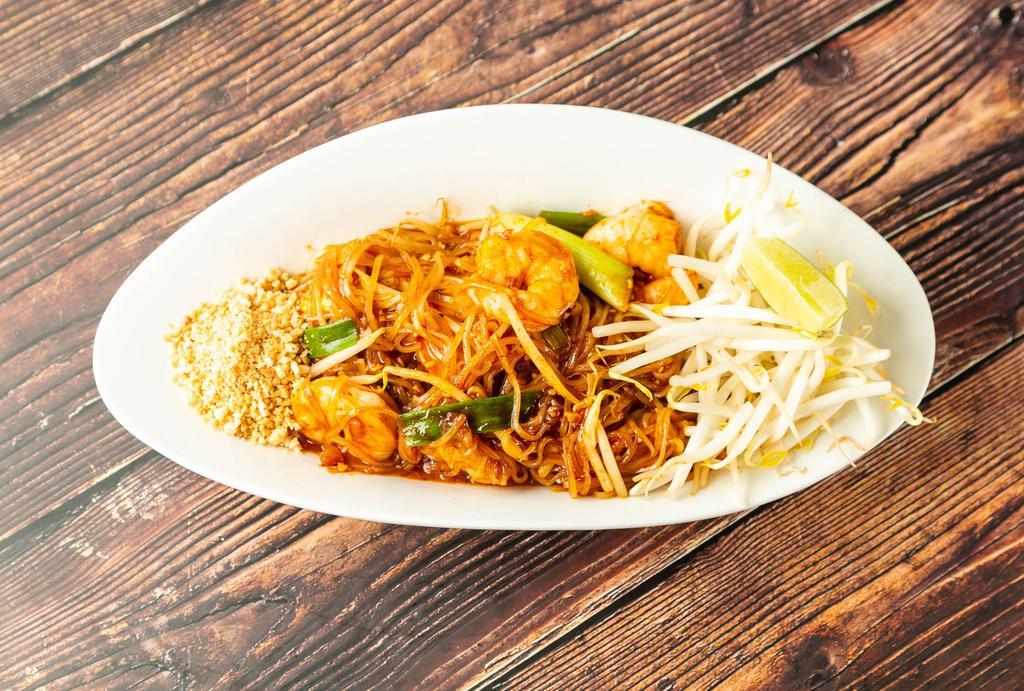 Pad Thai Noodle · Thai stick rice noodles with tofu, eggs, chopped radish, chives, bean sprouts, crushed peanuts, and your choice of protein.