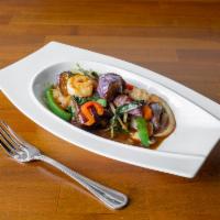 Pad Ma Kueryao · Eggplant basil. Green and red peppers, Thai basil and Japanese eggplant and string beans wit...