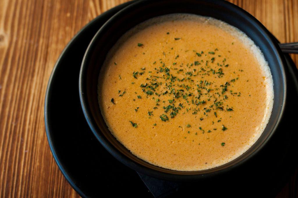 Lobster Bisque · Thick and creamy soup. 