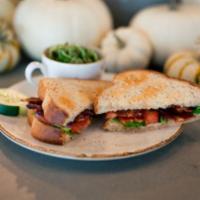 Homegrown BLT · broadbent bacon, bibb lettuce, tomato, basil
pesto mayo on toasted wheat bread; served with
...