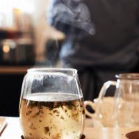 Communitea · Herbal tea: moringa, hibiscus, orange peel. Add-ons at no additional cost.