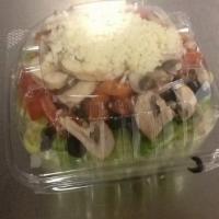 Garden Salad · Lettuce, tomato, black olives, green pepper, mushrooms and mozzarella cheese.