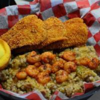 Chef Mouton's Special · 3 Fish Fillets with shrimp etouffee on bed of dirty rice and served with a cornbread muffin!