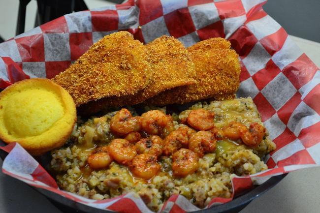 Chef Mouton's Special · 3 Fish Fillets with shrimp etouffee on bed of dirty rice and served with a cornbread muffin!