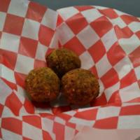 Boudin Ball · Our delicious boudin rolled in a ball and deep fried!