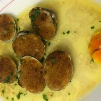 Clams Oreganata Dinner · Littleneck baked clams stuffed with garlic and oregano flavored bread crumbs with a touch of...