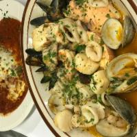 Zuppa di Pesce Dinner · An assortment of scallops, shrimp, clams, mussels, lobster, and fish in a light tomato sauce.