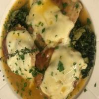 Vitello Saltimbocca Dinner · Veal scalloppine with prosciutto and fresh mozzarella, on a bed of fresh scarola in a brown ...