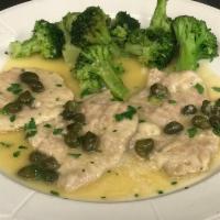 Vitello Piccata Dinner · Medallions of veal sauteed in a white wine, capers and lemon.