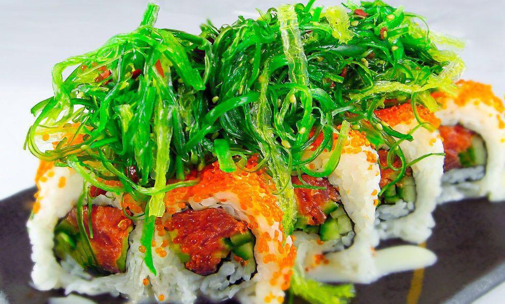 Poki Roll · In: Shrimp tempura, spicy tuna. Out: Seaweed salad.