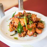 Mirapa Kodi · Deep fried chicken cooked with chili and special masala. Spicy.