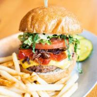 Enlightened Hunter · Beyond burger patty, Chao vegan cheese, grilled red onion, Mama Lil’s pickled peppers, icebe...