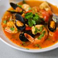 Parihuela Limo Soup (Best in Town) · The essence of mixed seafood smothered with our famous homestyle sauce with a shot of leche ...