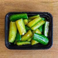 Garlicky Cucumbers · Asian cucumbers cut into small wedges and pickled in a garlicky vinegar.