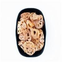 Lotus Root Chips · Made in-house. Sliced lotus roots fried in small batches until crunch then salted.