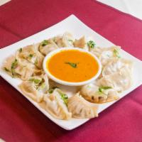 Mo Mo Nepal Ka Swad · 12 pieces. Steamed dumplings choice of chicken or vegetables.