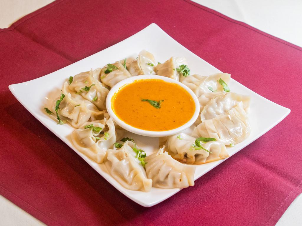 Mo Mo Nepal Ka Swad · 12 pieces. Steamed dumplings choice of chicken or vegetables.