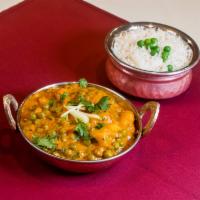 Aloo Mattar · Green peas, potatoes cooked in onion based sauce and spices.