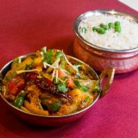 Kadai Shrimp · Shrimp, pieces of bell peppers, onions, tomatoes, and fenugreek.