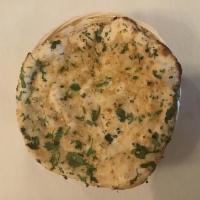 Garlic Naan · Naan stuffed with garlic and cilantro.
